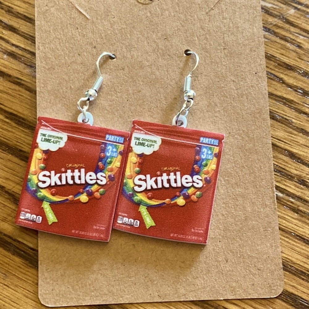 earrings with silver wires and a random gift bag